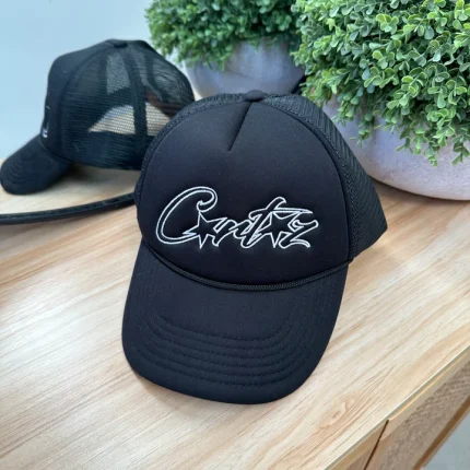 Corteiz Spellout Trucker Hat Black